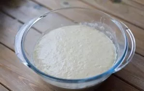 After half an hour, the volume of dough noticeably increased and acquired a porous structure.