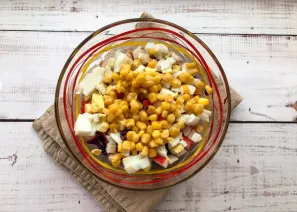 Pour in the canned corn.