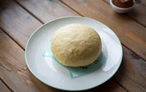 Knead the soft, non-stick dough, round in a bowl, cover with a kitchen towel and leave in a warm kitchen for half an hour. To achieve the...