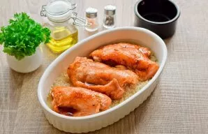 Put the chicken on top of the rice.