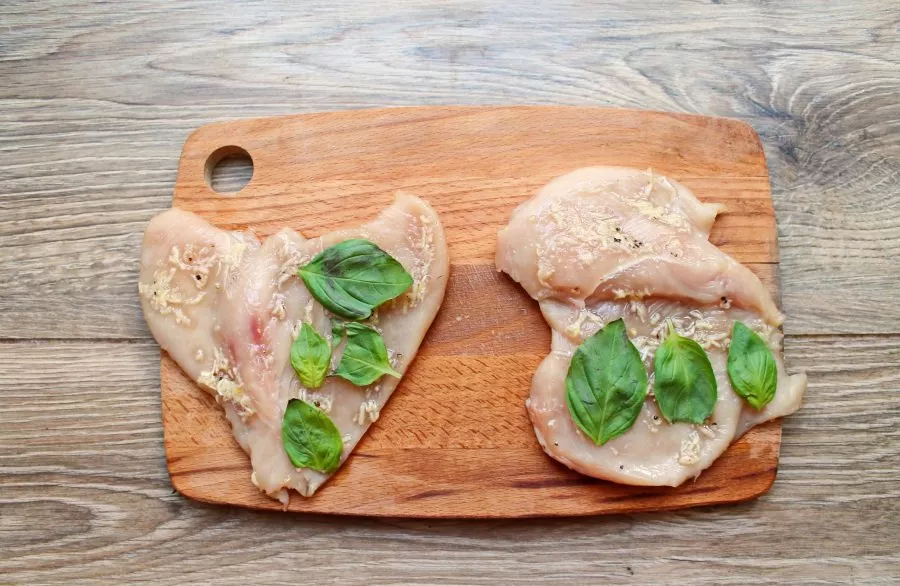 Pick the basil leaves and place the fillet on one side.