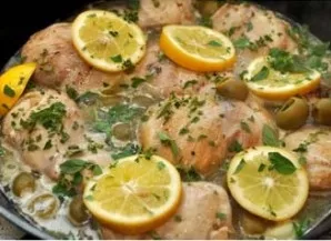 Pour in the broth and the juice of one lemon. Add olives, lemon slices and chopped thyme. If you have oregano, also chop a few twigs and ...