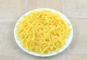 Grate the cheese on a medium or fine grater.