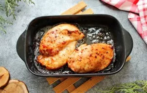 Bake chicken breasts in an oven at 180 degrees hot for 30-35 minutes until cooked and golden brown.