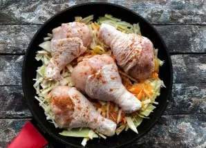 Put chicken thighs on top and add spices to taste.