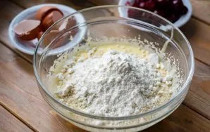 Add almond and coconut flour to this mixture and mix everything gently.