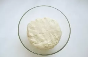 Knead soft, elastic dough. Cover with cling film and put in a warm place.