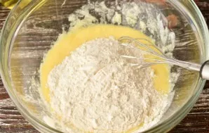 Stir and add the sifted flour.