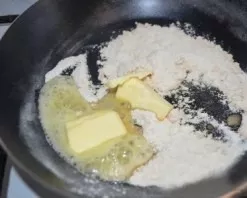 Fry the flour until it is creamy, add the butter and mix.