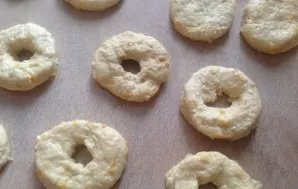 Grease the table and hands with vegetable oil and spread the dough, smooth it with your hands with a layer of about 1 cm. And squeeze the...