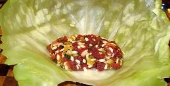First you need to boil the head of cabbage with boiling water for 5-6 minutes so that the leaves soften. We separate one sheet and put th...