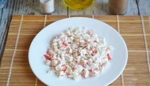 Cut the crab sticks into cubes.