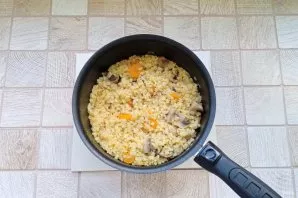 Cook bulgur with mushrooms until tender.