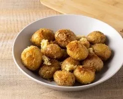 Add to the baked potatoes and mix.