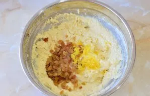 Then stir in the raisins and lemon zest.