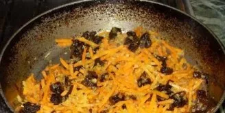 Add prunes, mix well and fry for another minute.