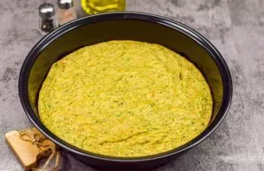 Remove the pizza base from the oven.