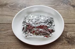 Wrap the pork in several layers of foil and put it in a baking dish with a little water. Place the container with meat in a hot oven and ...