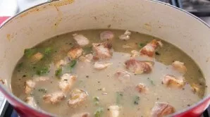 Add salt, cumin and other spices to taste, pour in the broth and simmer over medium heat for about an hour until the meat is tender.