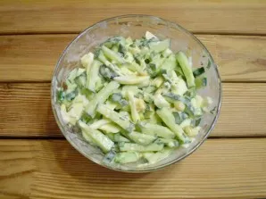 Mix. Egg and cucumber salad is ready! Enjoy your meal!