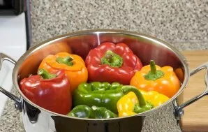 Cover with lids and put evenly in a saucepan. The number of peppers depends on the size of your pot.