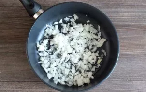 While the dough is in the refrigerator, prepare the filling. Cut the onion into small cubes. Fry in vegetable oil until tender and lightl...