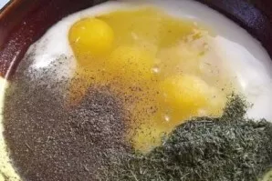 Mix eggs, yogurt, finely chopped dill. Add salt, pepper and mix everything well.