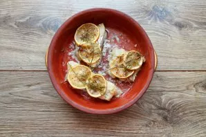 Place the container with the fish in a hot oven and bake for 20-25 minutes until the fish is ready. After a while, remove the mold with c...