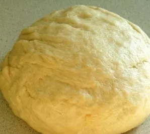 Knead the dough, shape it into a bun. The dough should be smooth. Do not be lazy to knead: the better you knead, the tastier the buns wil...
