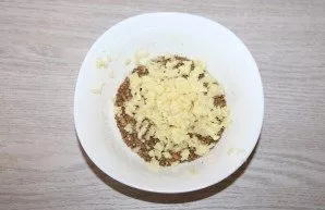 Press the garlic through a garlic press.