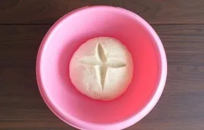 The prepared dough should be soft, elastic and not stick to your hands. Round the dough, transfer it to a bowl, make a cross-shaped cut o...