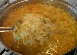 Also add cabbage, cook for 30 minutes. Then add the fried vegetables, boil for a minute and turn off the fire. Greens can be added either...