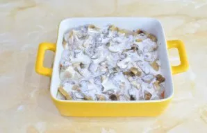 Pour everything with sour cream. If sour cream is thick, dilute it with a little water.