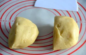 Divide the dough into 2 equal parts.