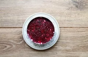 Place another 1/3 of the beets on top of the curd mass and smooth it out. Add the rest of the cottage cheese and make the top layer of be...