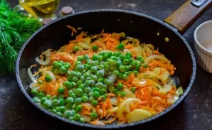 Add peas, salt and pepper to vegetables.