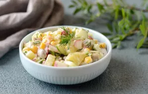 Salads with corn, mushrooms and cucumbers are ready. Enjoy your meal!