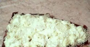 Cover the potatoes with sauce.