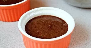 Pour the dough into buttered molds and place in an oven preheated to 200 degrees for 10-12 minutes.