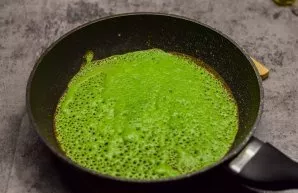 Heat the pan well and grease it with a little oil. Pour in the dough and bake pancakes for 30 seconds on each side.