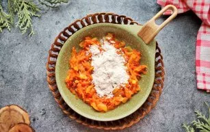 Pour vegetable oil into the pan, add chopped onions and grated carrots, fry for 5 minutes, stirring. Remove the pan from the heat and add...