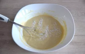 Finally, add soda, stir and do not mix anymore to maintain a rich structure of the dough.