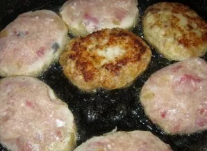 Form meatballs from the prepared minced meat and roll them in breadcrumbs on all sides. Heat a pan and fry the meatballs with oil until g...
