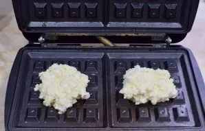 On a hot waffle iron, put a little cottage cheese dough with a spoon. If you are not sure about waffle iron, you can anoint its surface w...