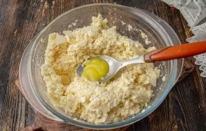 Add the melted butter and mix well.