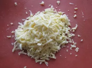 Grate the cheese on a medium or coarse grater. Salt the sauce to taste, if desired, add a pinch of white pepper.