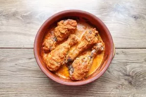 After a while, remove the foil and bake for another 10-15 minutes until golden brown. Remove the chicken legs from the oven and serve imm...