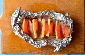 Carefully place the brisket on the foil and place in an oven preheated to 180 degrees.
