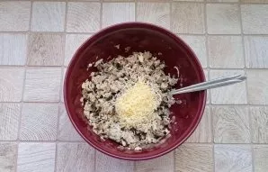 Add grated hard cheese, salt and pepper to taste.