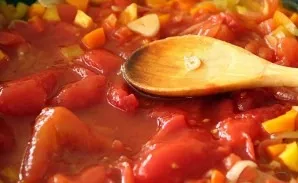 Lightly fry the unpeeled clove of garlic. When a golden crust appears, peel it off. Add chopped celery, bell peppers and fry over low hea...